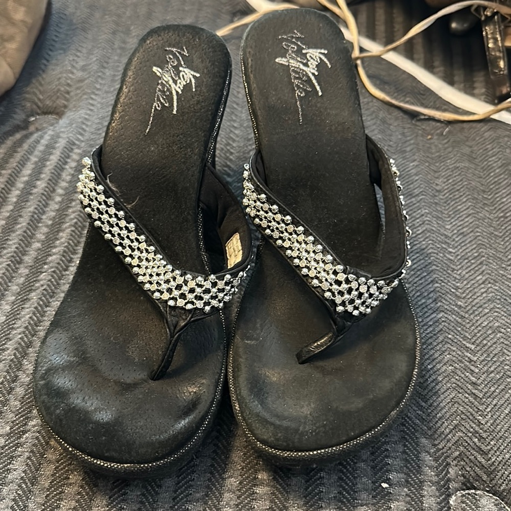 Black with silver size 9. Wedges.